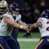 Nov 5, 2023; New Orleans, Louisiana, USA; Chicago Bears quarterback Tyson Bagent (17) hands the ball off to running back Roschon Johnson (23) against the New Orleans Saints during the first half at the Caesars Superdome.
