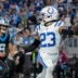 Indianapolis Colts cornerback Kenny Moore II (23) runs 49 yards for a touchdown after intercepting a pass by Carolina Panthers quarterback Bryce Young (9) on Sunday, Nov. 5, 2023, during a game against the Carolina Panthers at Bank of America Stadium in Charlotte.