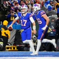 Nov 13, 2023; Orchard Park, New York, USA; Buffalo Bills tight end Dalton Kincaid (86) congratulates quarterback Josh Allen (17) for scoring a touchdown against the Denver Broncos during the second half at Highmark Stadium.