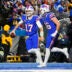 Nov 13, 2023; Orchard Park, New York, USA; Buffalo Bills tight end Dalton Kincaid (86) congratulates quarterback Josh Allen (17) for scoring a touchdown against the Denver Broncos during the second half at Highmark Stadium.