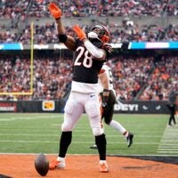 Cincinnati Bengals running back Joe Mixon (28) celebrates a touchdown catch and run in the first quarter during a Week 18 NFL football game between the Cleveland Browns at Cincinnati Bengals, Sunday, Jan. 7, 2024, at Paycor Stadium in Cincinnati.
