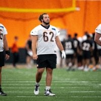 Cincinnati Bengals center Nate Gilliam (66), Cincinnati Bengals center Matt Lee (62) and Cincinnati Bengals offensive tackle Eric Miller (74) look on at Bengals spring practice at the IEL Indoor Facility in Cincinnati on Thursday, June 13, 2024.