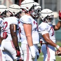 The Crimson Tide players and coaches continue working toward the season opener in practice Tuesday, Aug. 13, 2024. Alabama offensive lineman Parker Brailsford (72) signals as he prepares to lead the offensive line through a blocking drill.