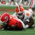 Clemson defensive lineman Peter Woods (11) sacks Georgia quarterback Carson Beck (15) during the first half of the NCAA Aflac Kickoff Game against Clemson in Atlanta, on Saturday, Aug. 31, 2024.