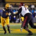 Sep 14, 2024; Berkeley, California, USA; California Golden Bears linebacker Xavier Carlton (left) rushes against San Diego State Aztecs offensive lineman Christian Jones (right) during the second quarter at California Memorial Stadium.