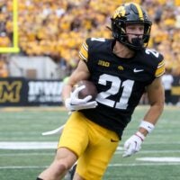 Iowa’s Kaden Wetjen (21) runs with the ball against Troy Saturday, Sept. 14, 2024 at Kinnick Stadium in Iowa City, Iowa.