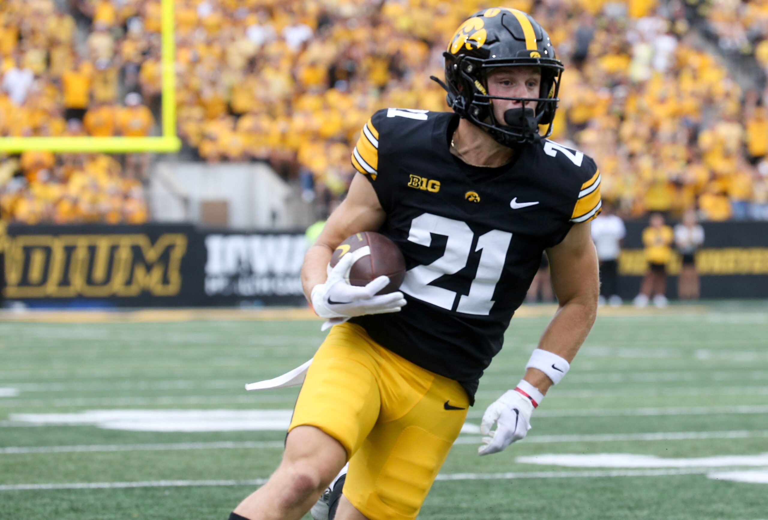 Iowa’s Kaden Wetjen (21) runs with the ball against Troy Saturday, Sept. 14, 2024 at Kinnick Stadium in Iowa City, Iowa.