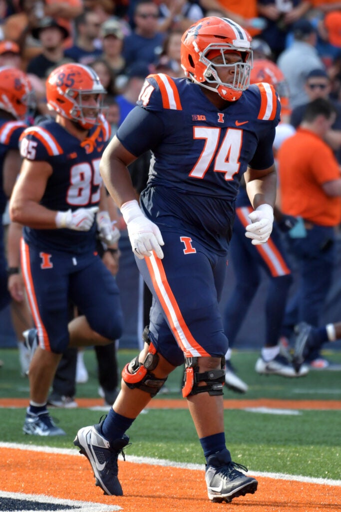 Oct 12, 2024; Champaign, Illinois, USA;  Illinois Fighting Illini offensive lineman J.C. Davis (74) in the first half against the Purdue Boilermakers at Memorial Stadium. Mandatory Credit: Ron Johnson-Imagn Images