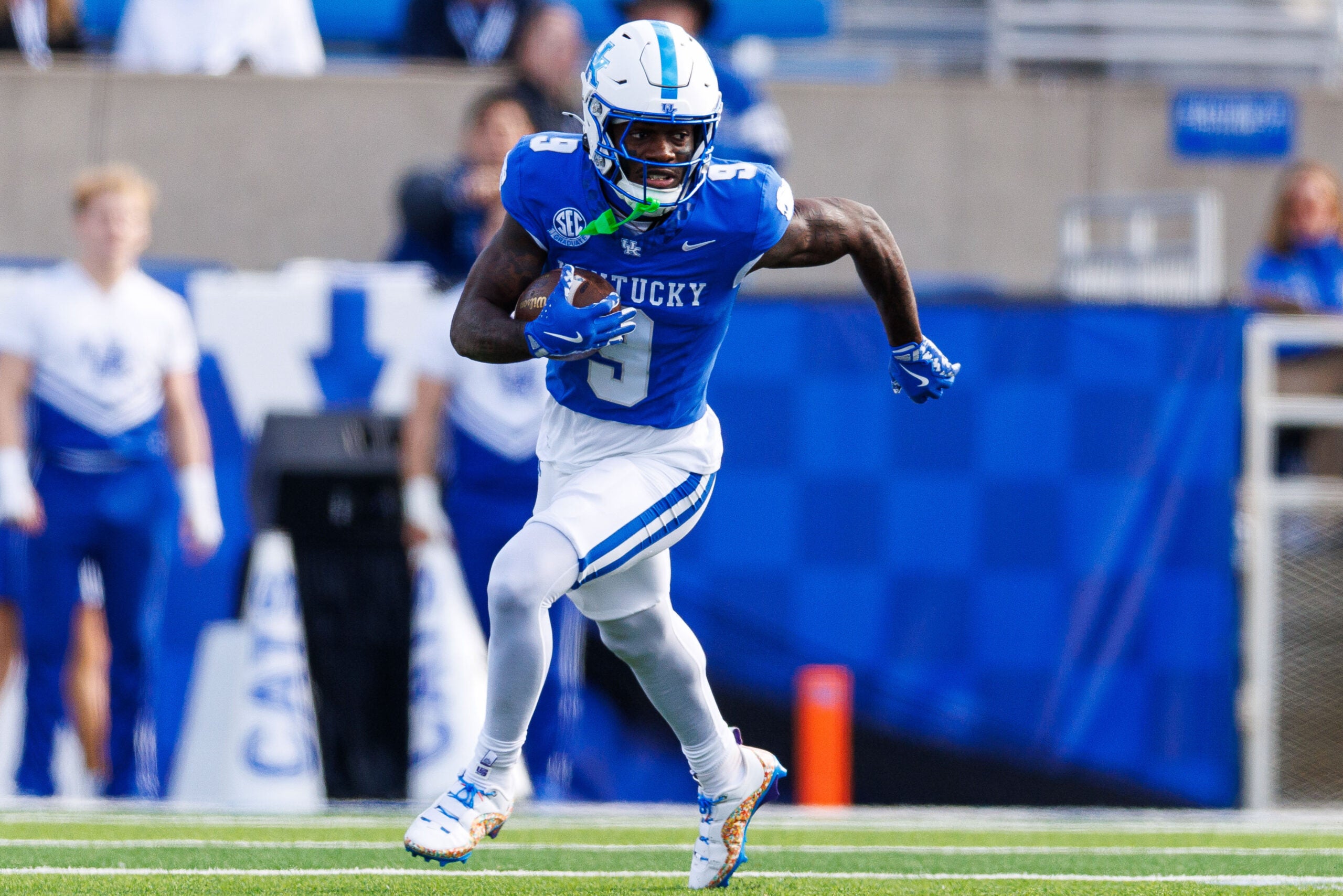 Nov 16, 2024; Lexington, Kentucky, USA; Kentucky Wildcats wide receiver Ja'Mori Maclin (9) runs the ball during the first quarter against the Murray State Racers at Kroger Field.
