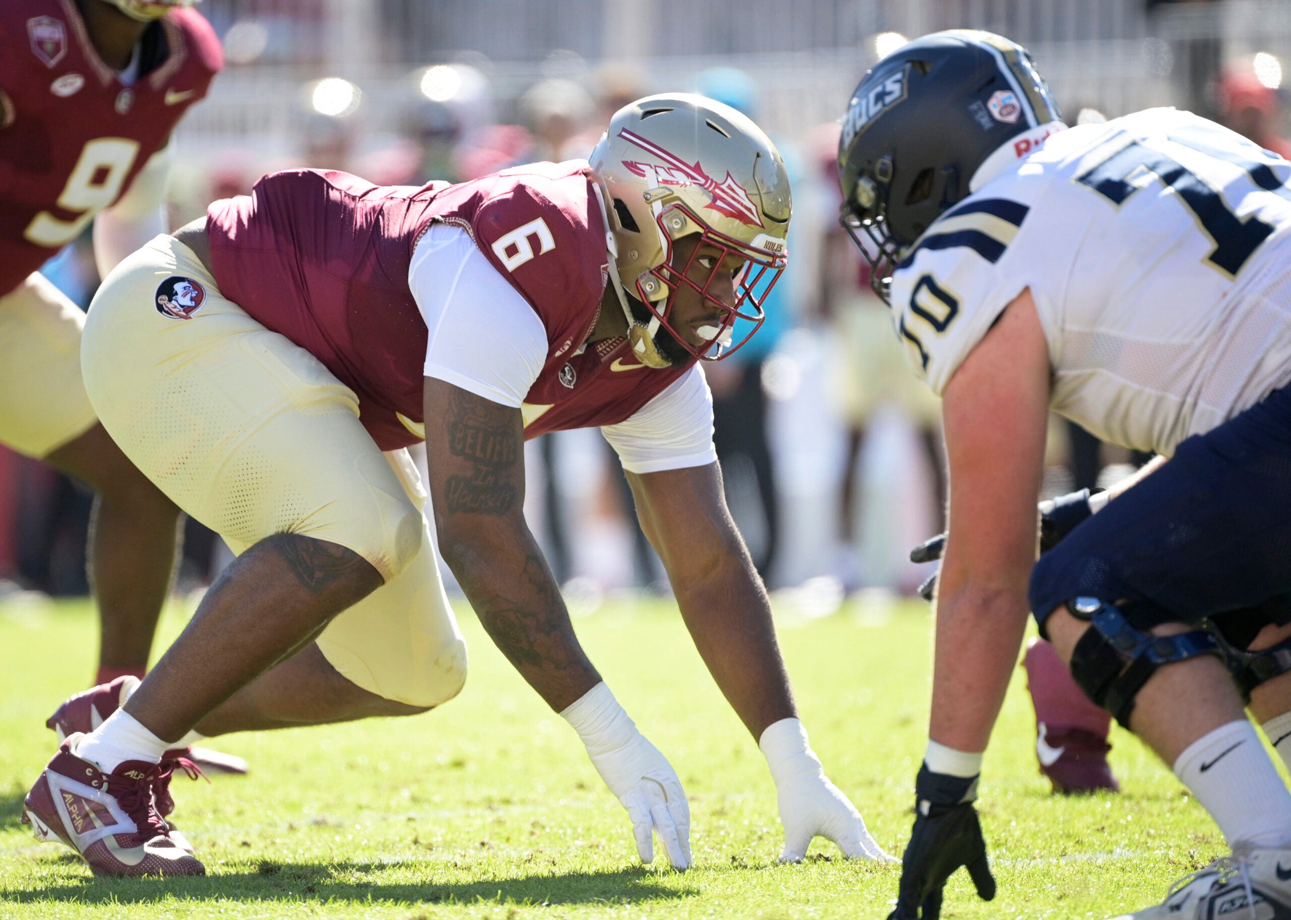 Nov 23, 2024; Tallahassee, Florida, USA; Florida State Seminoles defensive lineman Darrell Jackson Jr. (6) prepares for the snap during the first quarter against the Charleston Southern Buccaneers at Doak S. Campbell Stadium.
