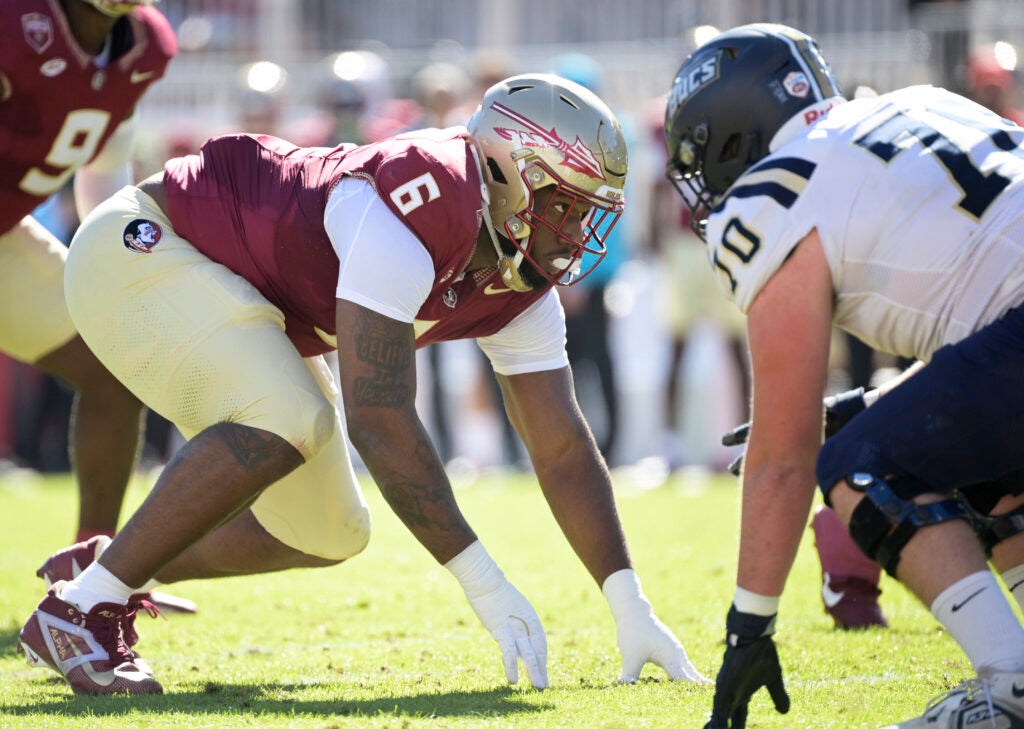Nov 23, 2024; Tallahassee, Florida, USA; Florida State Seminoles defensive lineman Darrell Jackson Jr. (6) prepares for the snap during the first quarter against the Charleston Southern Buccaneers at Doak S. Campbell Stadium.