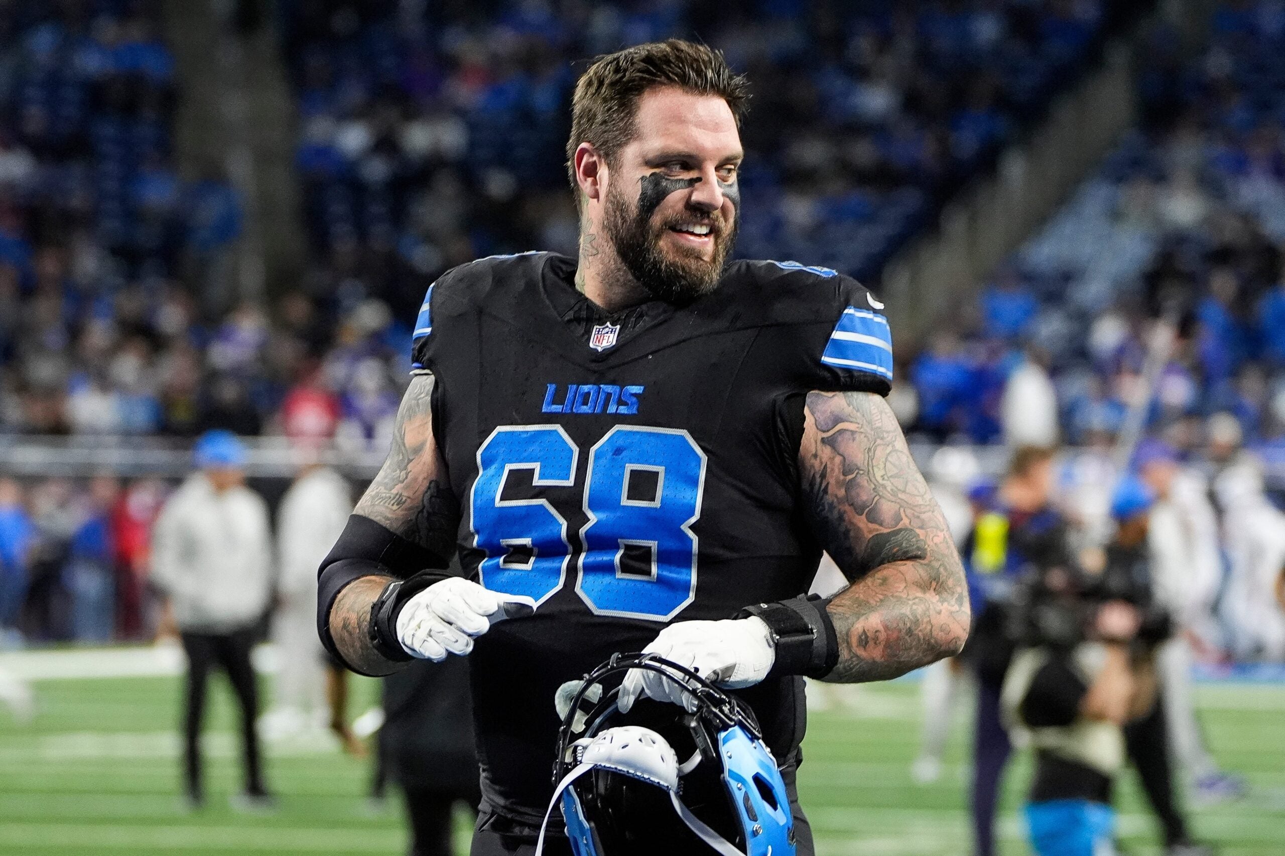 Detroit Lions offensive tackle Taylor Decker (68) smiles at warm up before the game between Detroit Lions and Buffalo Bills at Ford Field in Detroit on Sunday, Dec. 15, 2024.