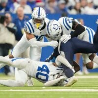 Colts LB Jaylon Carlies, CB Jayon Jones and former safety Nick Cross combine for a tackle