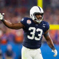 Dec 31, 2024; Glendale, AZ, USA; Penn State Nittany Lions defensive end Dani Dennis-Sutton (33) against the Boise State Broncos during the Fiesta Bowl at State Farm Stadium.