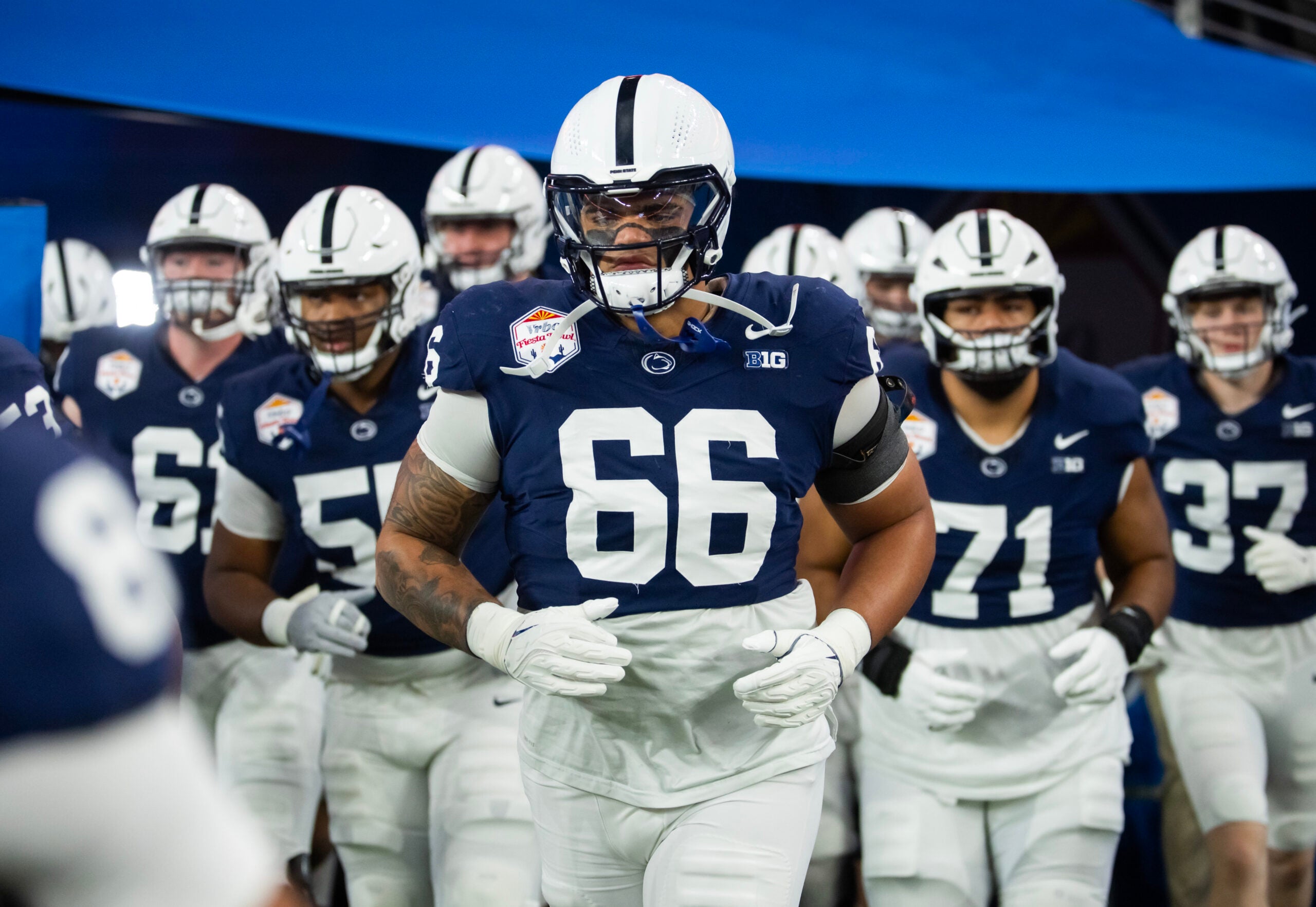 Dec 31, 2024; Glendale, AZ, USA; Penn State Nittany Lions offensive lineman Drew Shelton (66) against the Boise State Broncos during the Fiesta Bowl at State Farm Stadium.