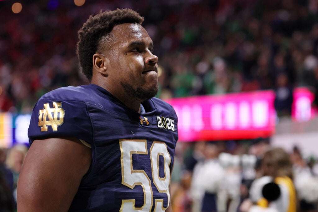 Jan 20, 2025; Atlanta, GA, USA; Notre Dame Fighting Irish offensive lineman Aamil Wagner (59) reacts after losing against the Ohio State Buckeyes in the CFP National Championship college football game at Mercedes-Benz Stadium.