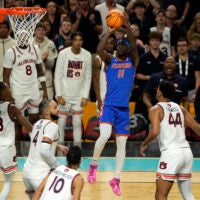 Apr 5, 2025; San Antonio, TX, USA; Florida Gators guard Denzel Aberdeen (11) shoots the ball against the Auburn Tigers during the first half in the semifinals of the men's Final Four of the 2025 NCAA Tournament at Alamodome.