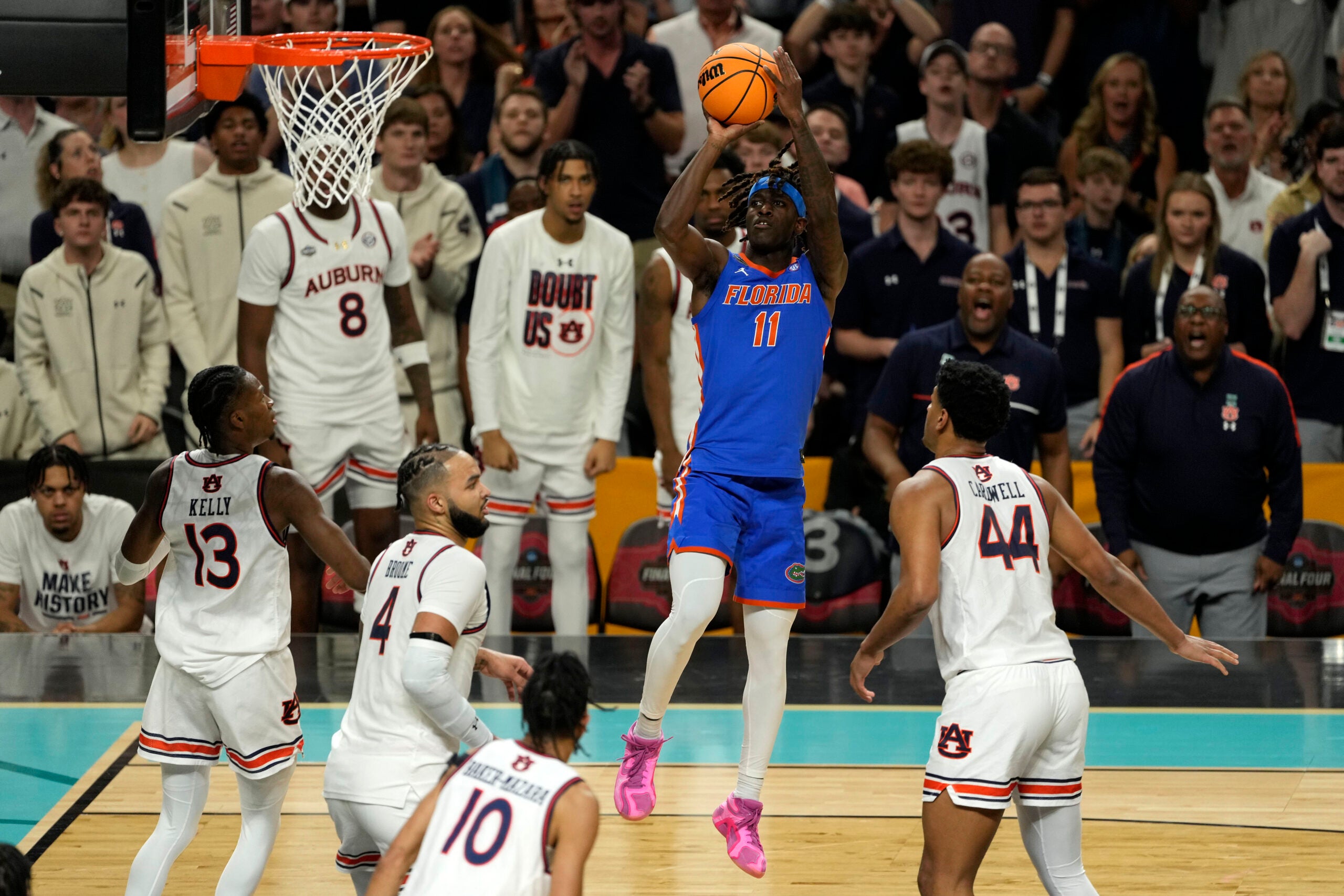 Apr 5, 2025; San Antonio, TX, USA; Florida Gators guard Denzel Aberdeen (11) shoots the ball against the Auburn Tigers during the first half in the semifinals of the men's Final Four of the 2025 NCAA Tournament at Alamodome.