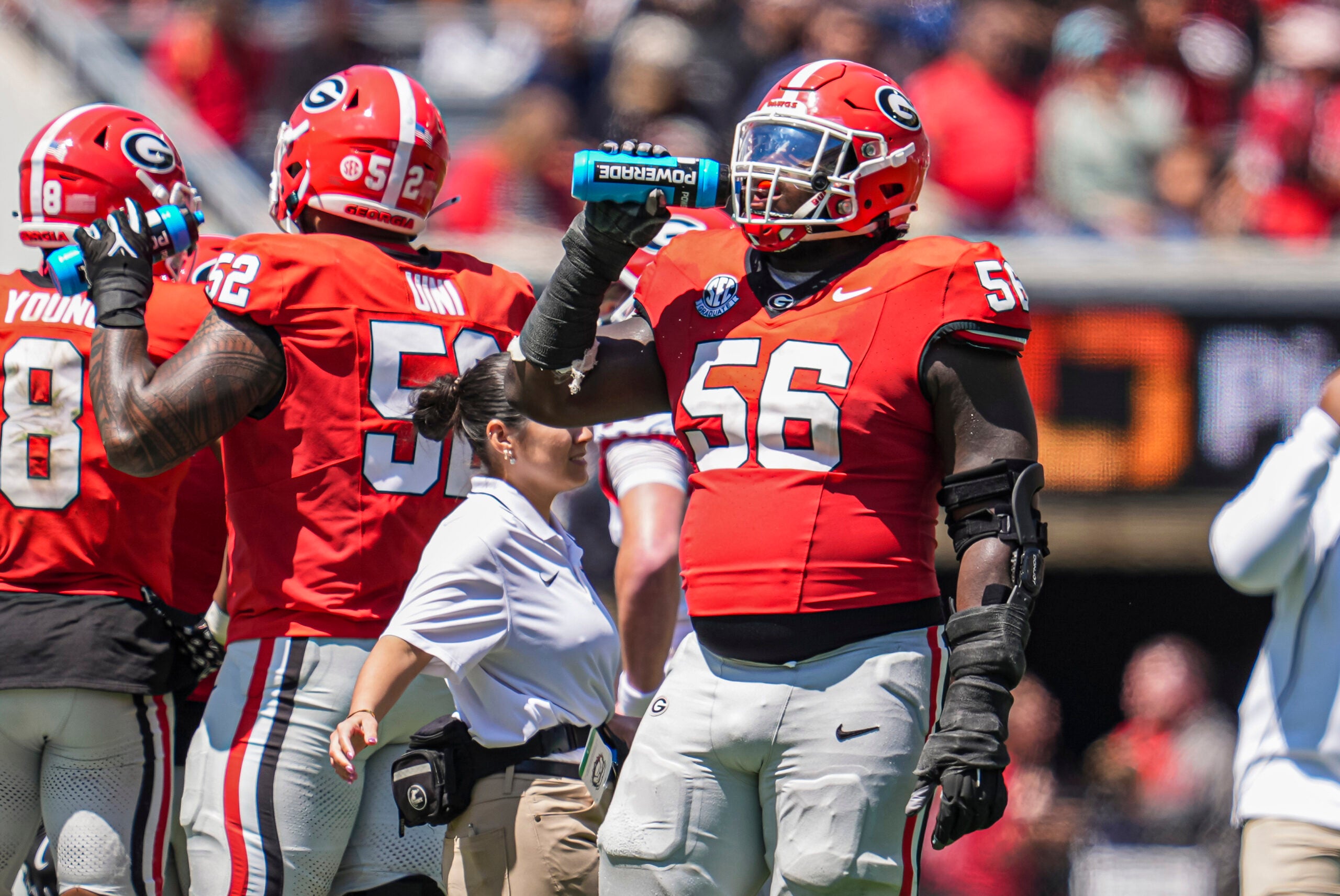 Apr 12, 2025; Athens, GA, USA; Georgia Bulldogs offensive lineman Micah Morris (56) takes a drink during the Georgia Spring game at Sanford Stadium.