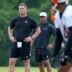 Cincinnati Bengals head coach Zac Taylor watches during a session of organized team activities on the Bengals practice field at Paycor Stadium in downtown Cincinnati on Tuesday, June 3, 2025.