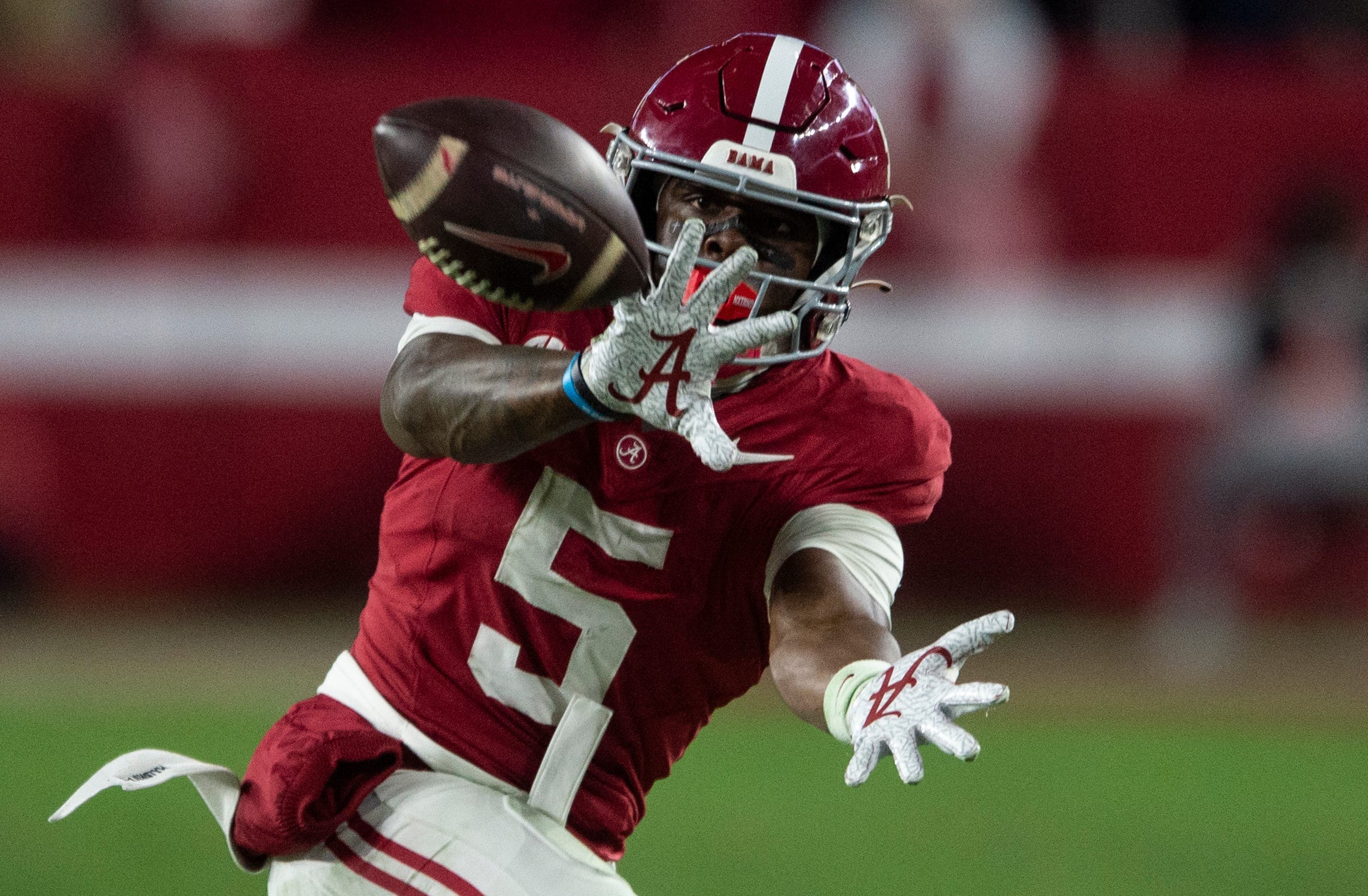 Alabama wide receiver Germie Bernard catches a pass in a game at Bryant-Denny Stadium during the 2024 season.