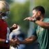Notre Dame head coach Marcus Freeman, right, greets quarterback Kenny Minchey (8) during a football practice at Irish Athletic Center on Wednesday, Aug. 6, 2025, in South Bend.