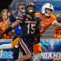 Aug 31, 2025; Atlanta, Georgia, USA; Virginia Tech Hokies wide receiver Donavon Greene (3) tries to make a one handed catch behind South Carolina Gamecocks defensive back Brandon Cisse (15) during the second half at Mercedes-Benz Stadium.