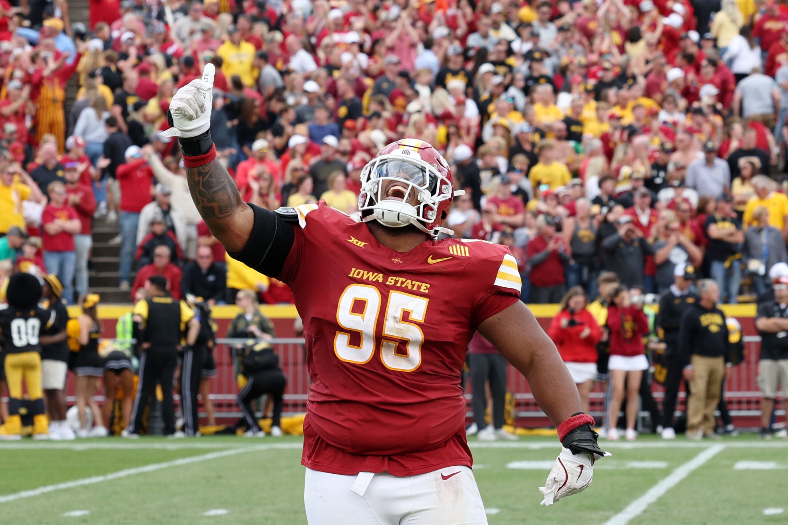 Sep 6, 2025; Ames, Iowa, USA; Iowa State Cyclones defensive lineman Domonique Orange (95) celebrates after a play against the Iowa Hawkeyes during the second half at Jack Trice Stadium.