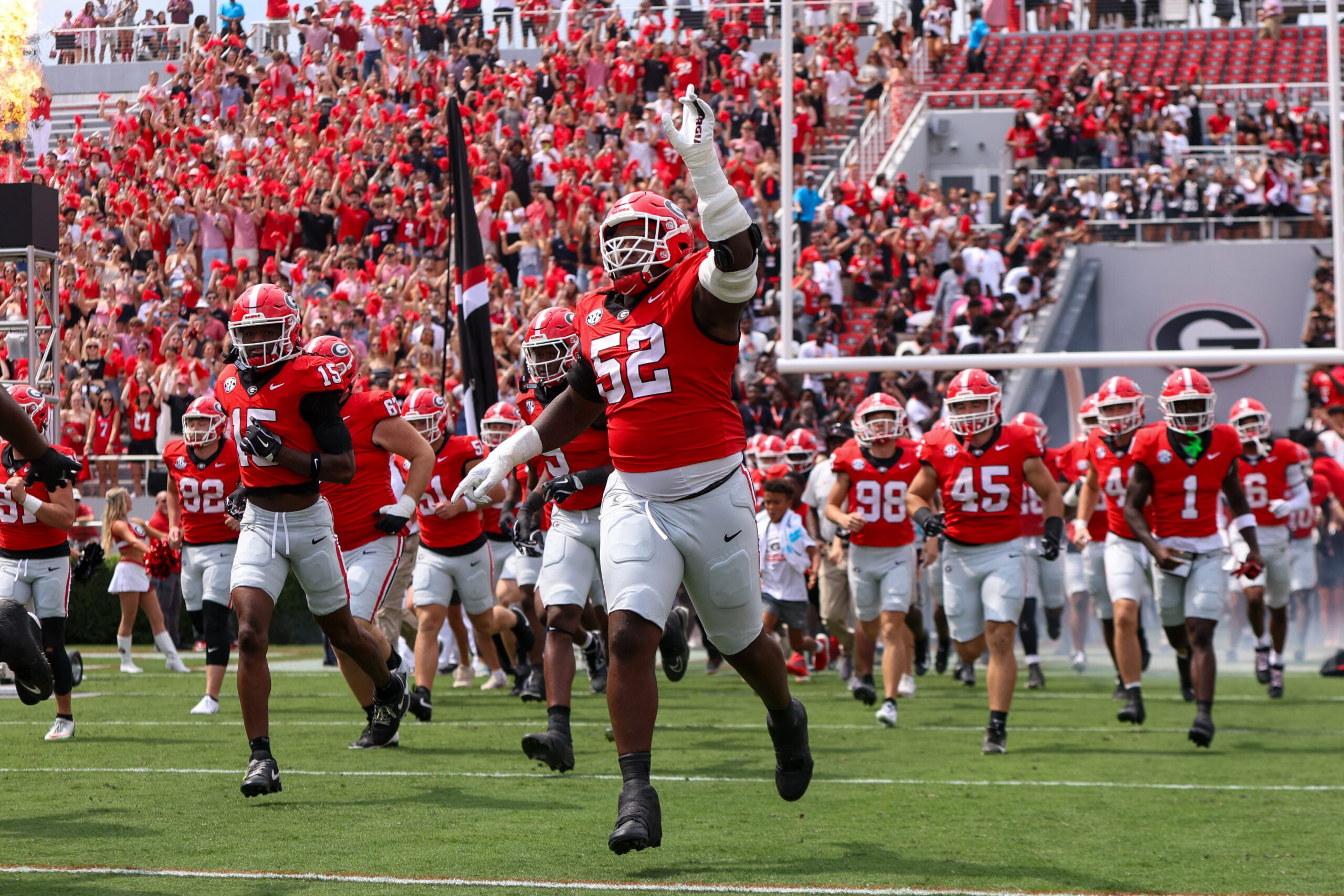 Sep 6, 2025; Athens, Georgia, USA; Georgia Bulldogs defensive lineman Christen Miller (52) runs on the field before a game against the Austin Peay Governors at Sanford Stadium.