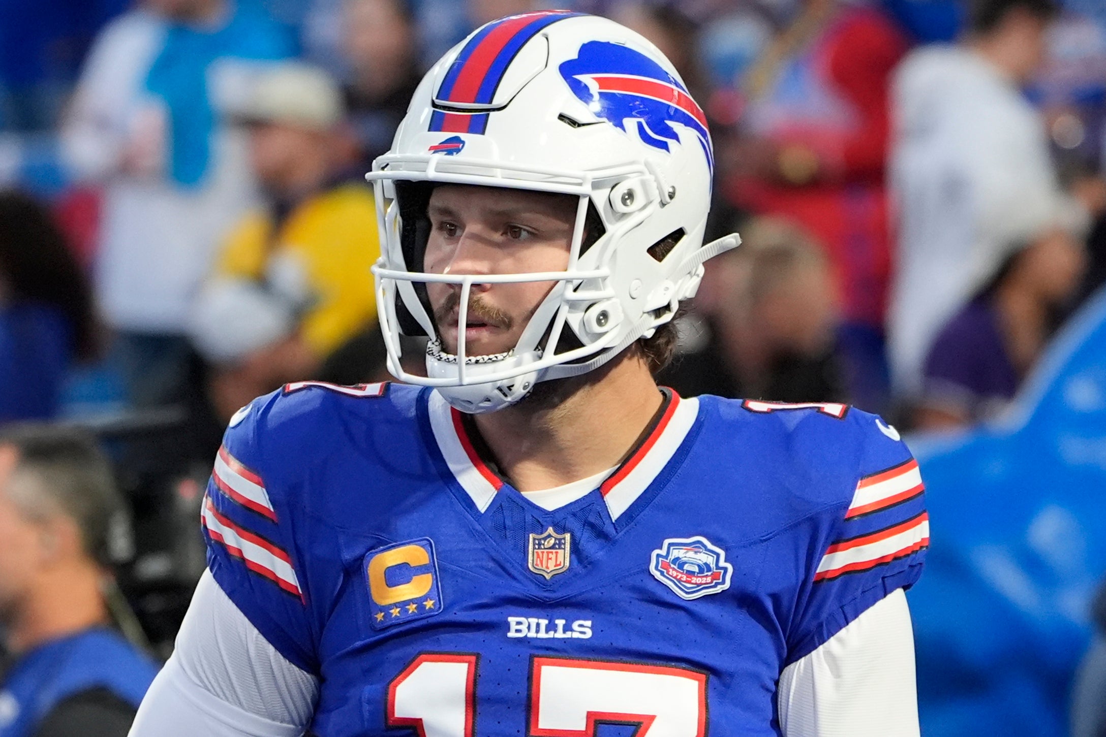 Sep 7, 2025; Orchard Park, New York, USA; Gold shield patch is shown on the jersey of Buffalo Bills quarterback Josh Allen (17) during warm up prior to the game against the Baltimore Ravens at Highmark Stadium.