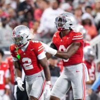 Ohio State Buckeyes safety Caleb Downs (2) and linebacker Sonny Styles (0) celebrate in the second half at the Ohio Stadium on Saturday, Sept. 13, 2025 in Columbus, Ohio.