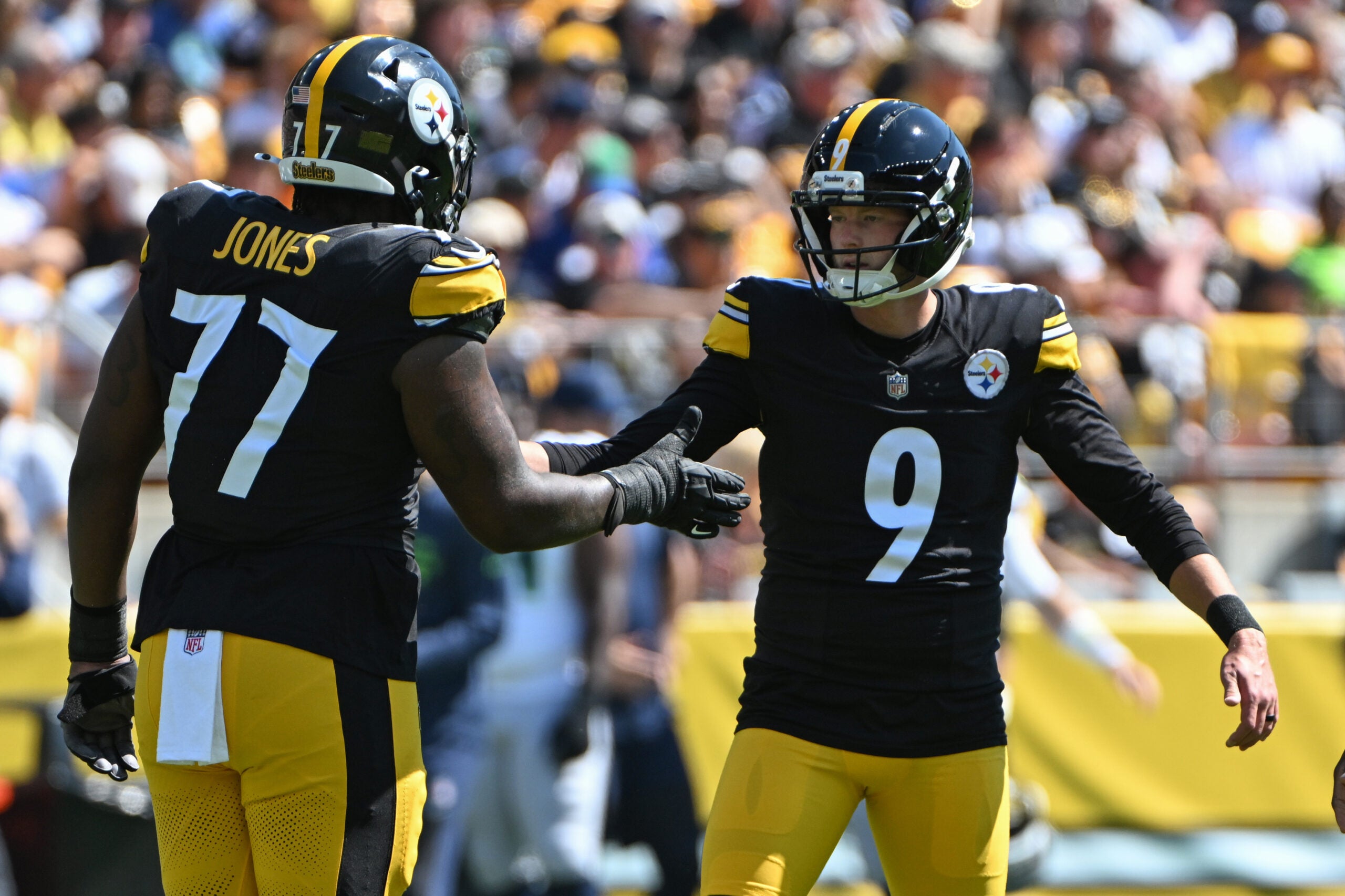 Sep 14, 2025; Pittsburgh, Pennsylvania, USA; Pittsburgh Steelers place kicker Chris Boswell (9) celebrates a filed goal with offensive tackle Broderick Jones (77) against the Seattle Seahawks during the first quarter at Acrisure Stadium.