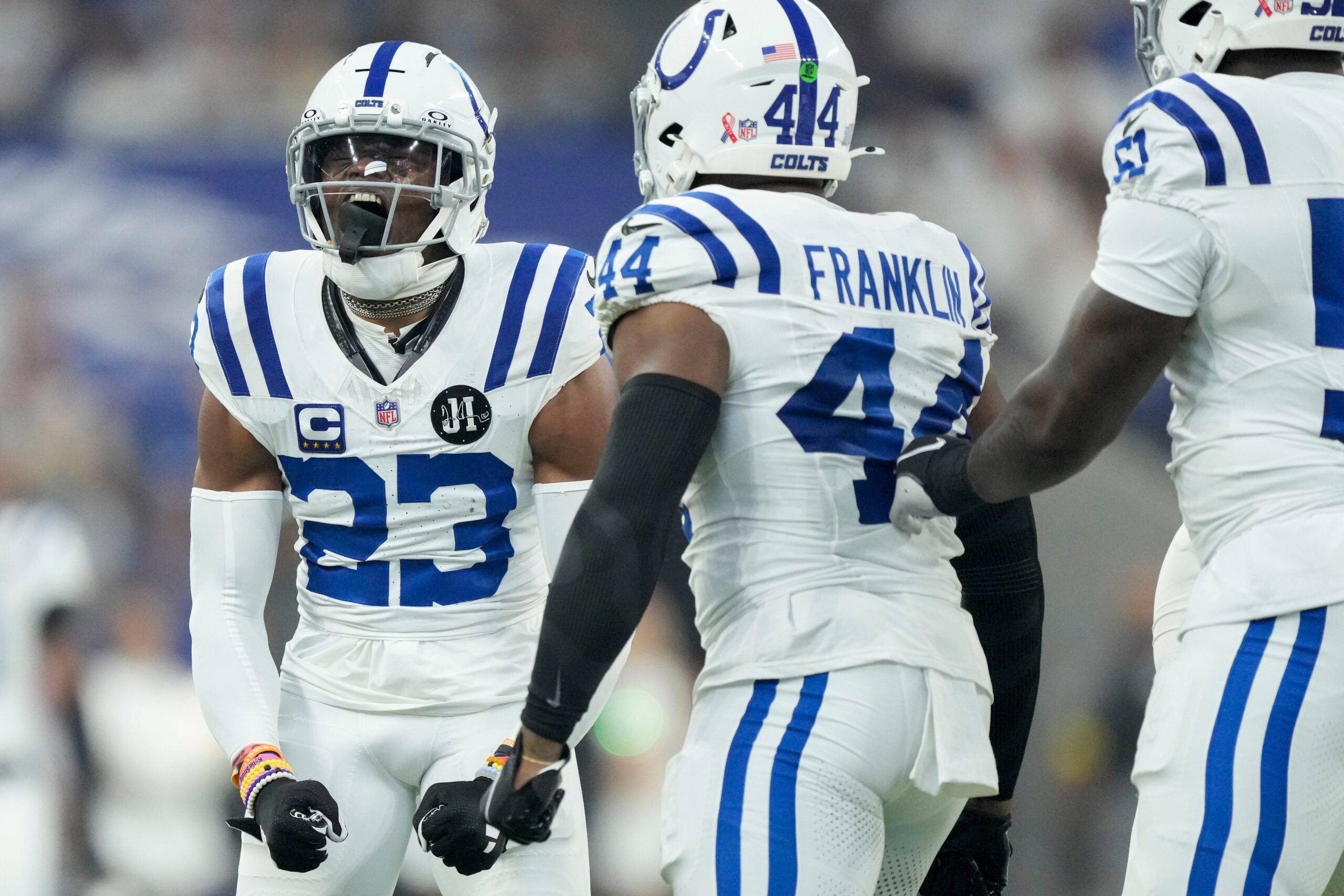 Indianapolis Colts cornerback Kenny Moore II (23) reacts after taking down Denver Broncos wide receiver Troy Franklin (11) on Sunday, Sept. 14, 2025, during a game at Lucas Oil Stadium in Indianapolis.