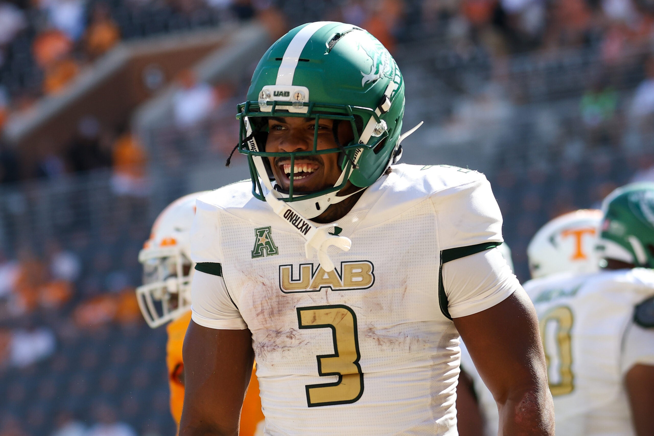 Sep 20, 2025; Knoxville, Tennessee, USA; UAB Blazers running back Isaiah Jacobs (3) celebrates after scoring a touchdown against the Tennessee Volunteers during the second half at Neyland Stadium.