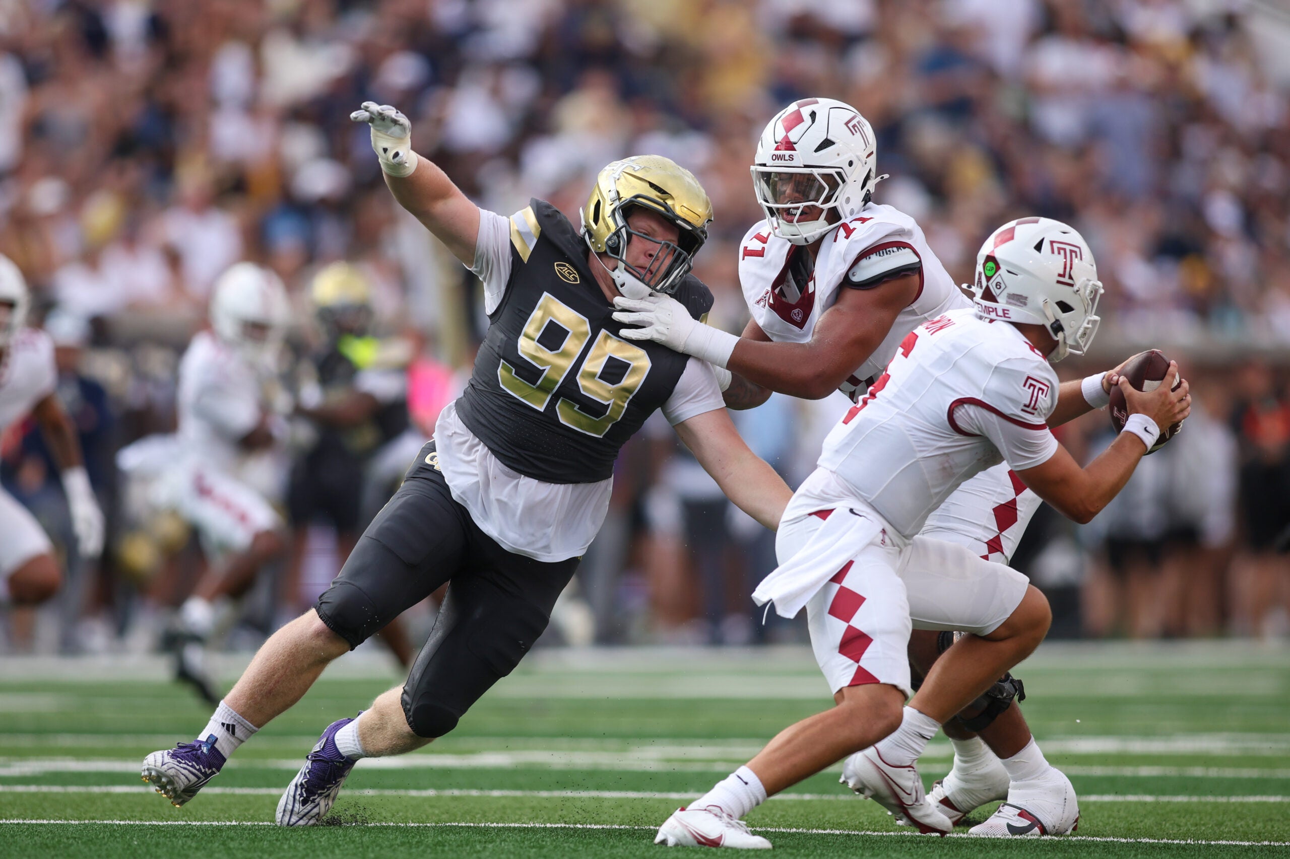 Sep 20, 2025; Atlanta, Georgia, USA; Georgia Tech Yellow Jackets defensive lineman Jordan van den Berg (99) rushes the passer against the Temple Owls in the second quarter at Bobby Dodd Stadium at Hyundai Field.