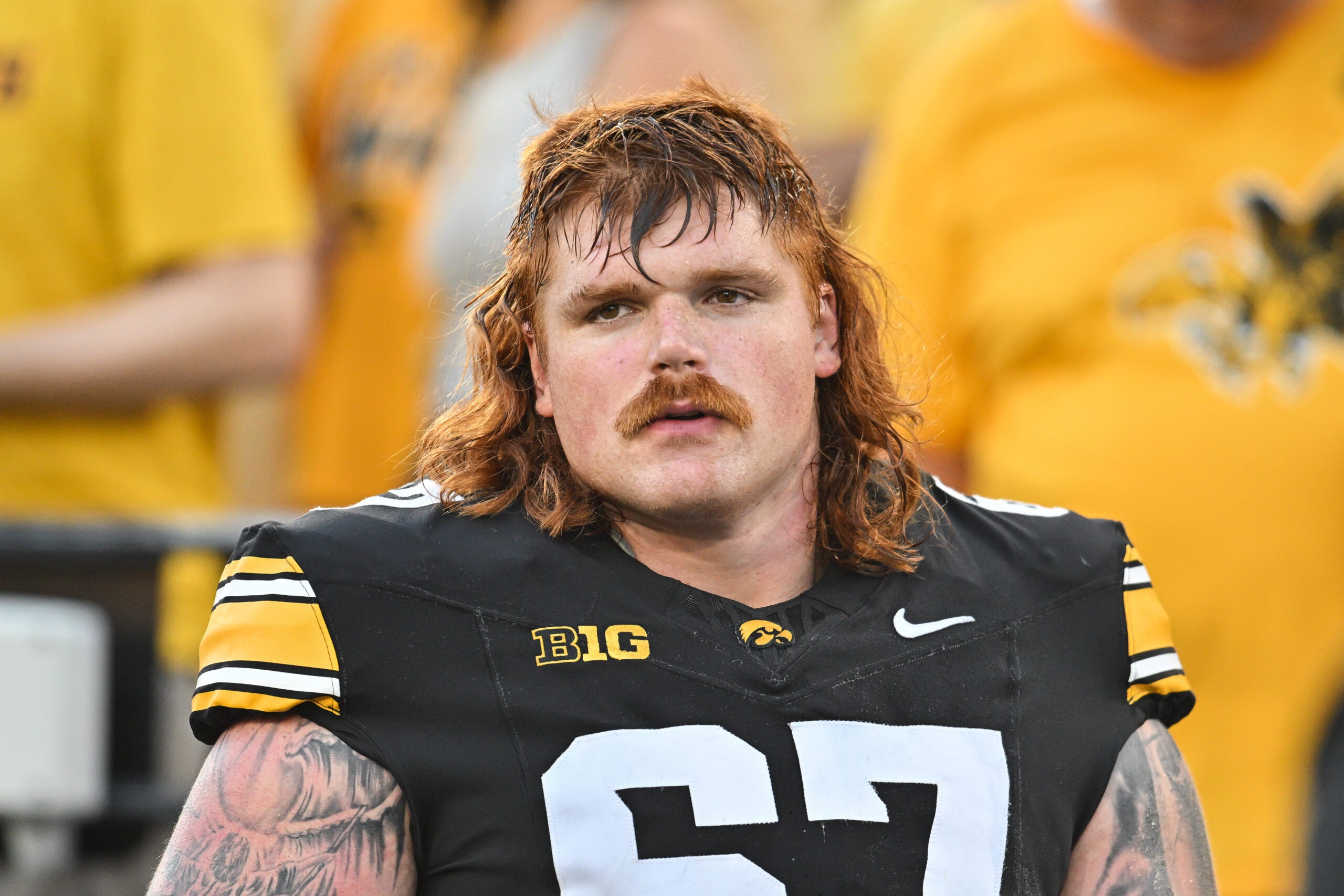 Sep 13, 2025; Iowa City, Iowa, USA; Iowa Hawkeyes offensive lineman Gennings Dunker (67) looks on before the game against the Massachusetts Minutemen at Kinnick Stadium.