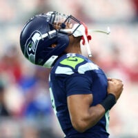 Sep 25, 2025; Glendale, Arizona, USA; Seattle Seahawks safety Coby Bryant (8) warms up before the game against the Arizona Cardinals at State Farm Stadium.