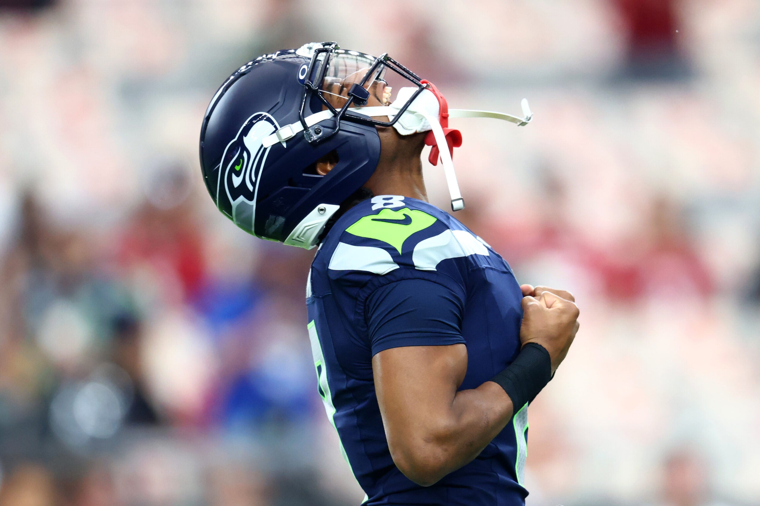 Sep 25, 2025; Glendale, Arizona, USA; Seattle Seahawks safety Coby Bryant (8) warms up before the game against the Arizona Cardinals at State Farm Stadium.