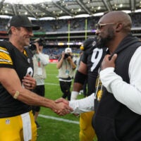 Sep 28, 2025; Dublin, Ireland; Pittsburgh Steelers quarterback Aaron Rodgers (8) and coach Mike Tomlin shake hands after an NFL International Series game against the Minnesota Vikings at Croke Park.