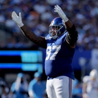 Sep 28, 2025; East Rutherford, New Jersey, USA; New York Giants defensive tackle Dexter Lawrence (97) reacts during the fourth quarter against the Los Angeles Chargers at MetLife Stadium.