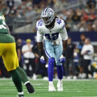 Sep 28, 2025; Arlington, Texas, USA; Dallas Cowboys defensive end Jadeveon Clowney looks on in the second half against the Green Bay Packers at AT&T Stadium.