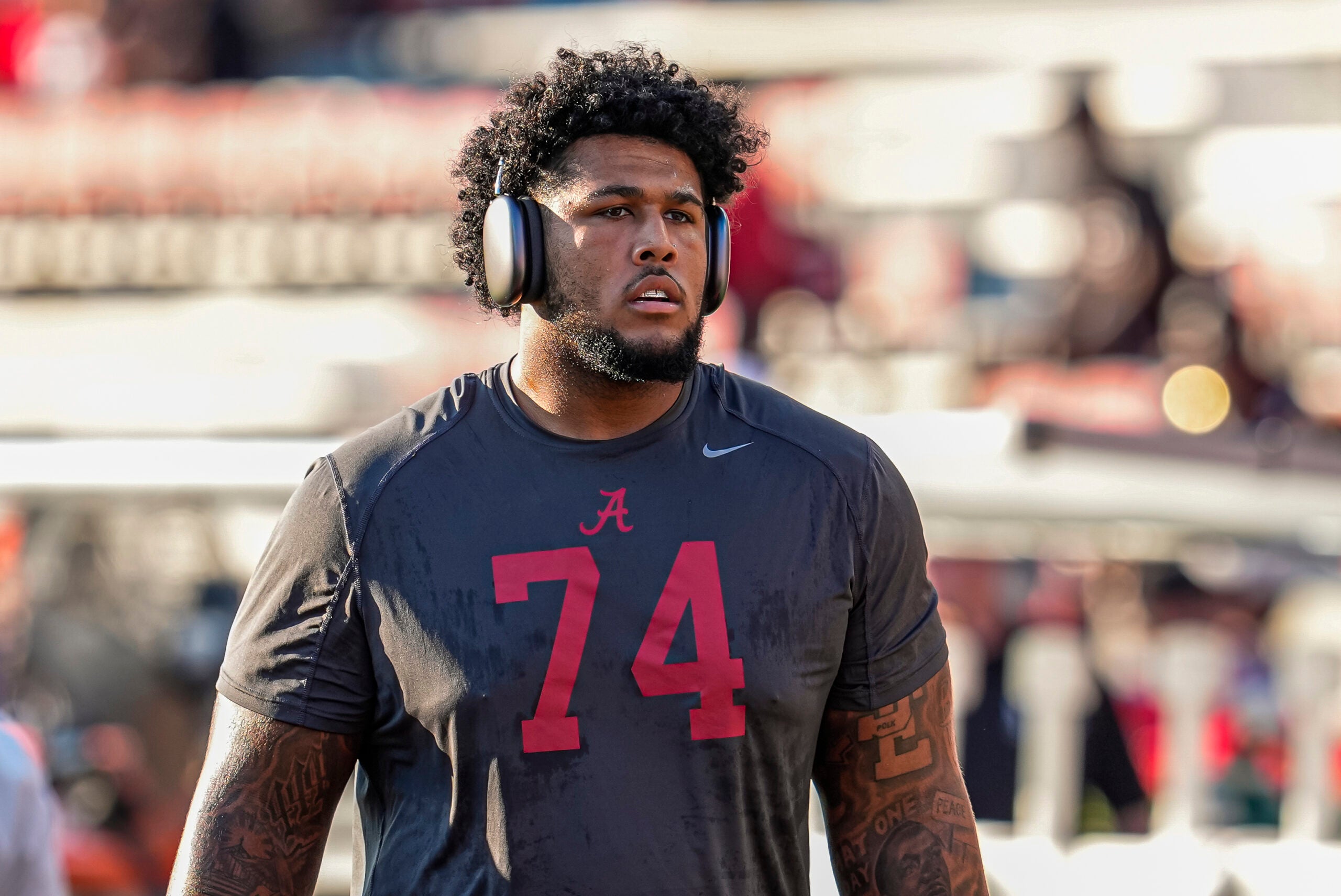 Sep 27, 2025; Athens, Georgia, USA; Alabama Crimson Tide offensive lineman Kadyn Proctor (74) on the field before the game against the Georgia Bulldogs at Sanford Stadium.