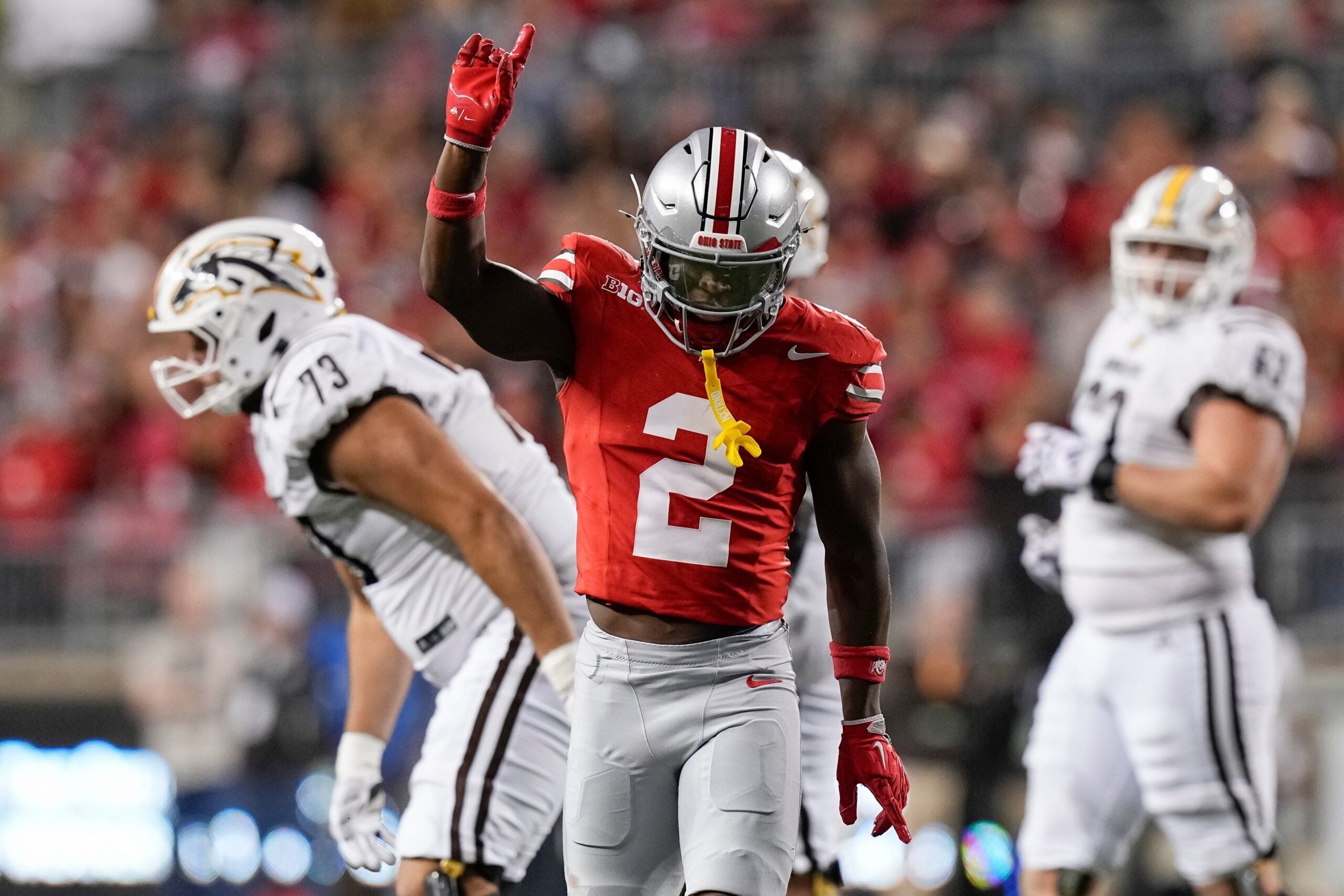 Ohio State safety Caleb Downs celebrates a play against Western Michigan.