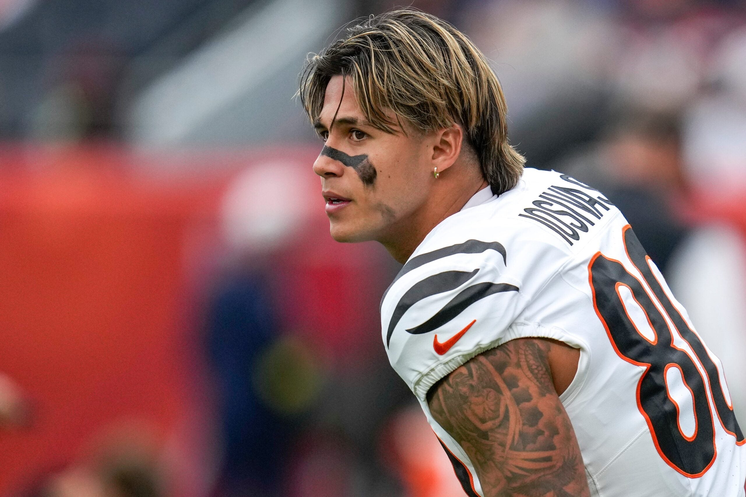 Cincinnati Bengals wide receiver Andrei Iosivas (80) stretches before the first quarter of the NFL Week 4 Monday Night Football game between the Denver Broncos and the Cincinnati Bengals at Empower Field at Mile High in Denver on Monday, Sept. 29, 2025.