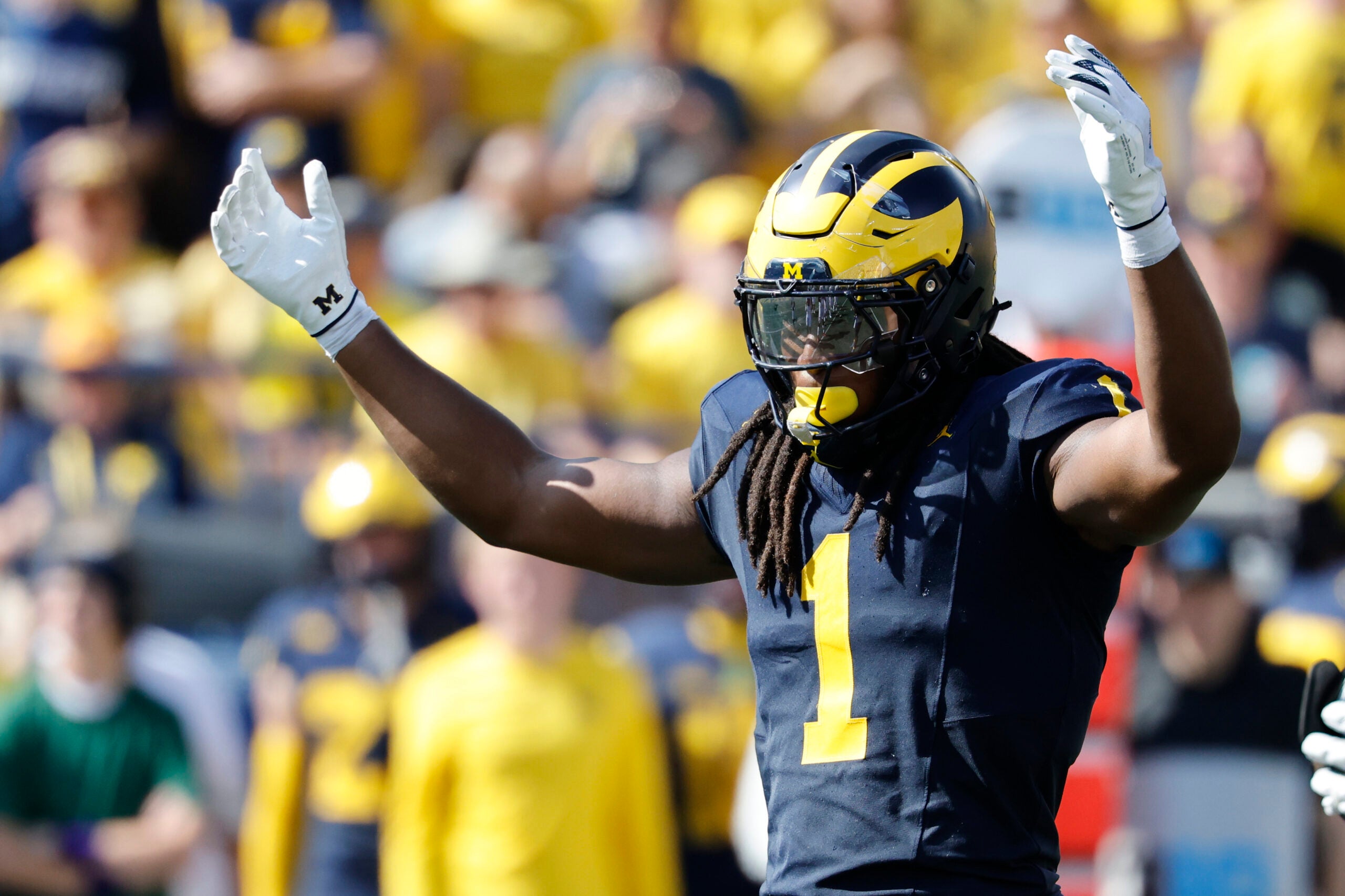 Oct 4, 2025; Ann Arbor, Michigan, USA; Michigan Wolverines linebacker Jaishawn Barham (1) reacts in the second half against the Wisconsin Badgers at Michigan Stadium.