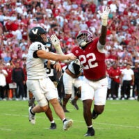 Oct 4, 2025; Tuscaloosa, Alabama, USA; Vanderbilt Commodores quarterback Diego Pavia (2) is pressured by Alabama Crimson Tide defensive lineman LT Overton (22) during the second half at Saban Field at Bryant-Denny Stadium.