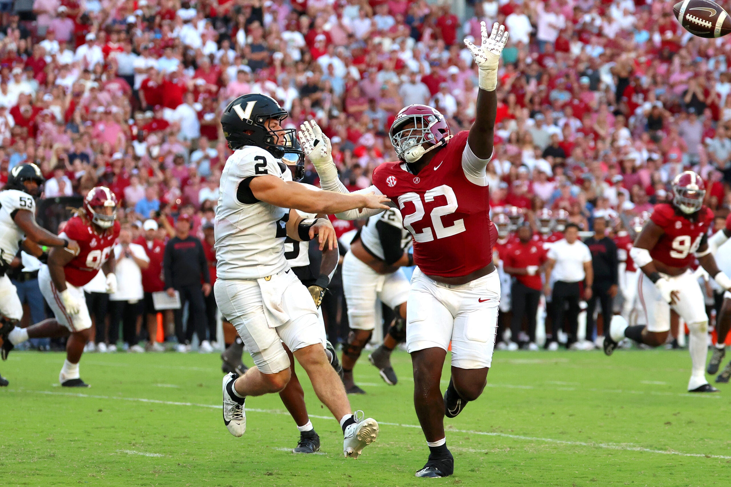 Oct 4, 2025; Tuscaloosa, Alabama, USA; Vanderbilt Commodores quarterback Diego Pavia (2) is pressured by Alabama Crimson Tide defensive lineman LT Overton (22) during the second half at Saban Field at Bryant-Denny Stadium.