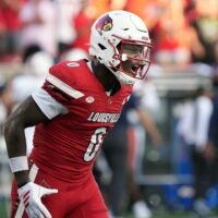 Louisville’s Chris Bell celebrates scoring a touchdown against Virginia at L&N Stadium Saturday. Oct. 4, 2025