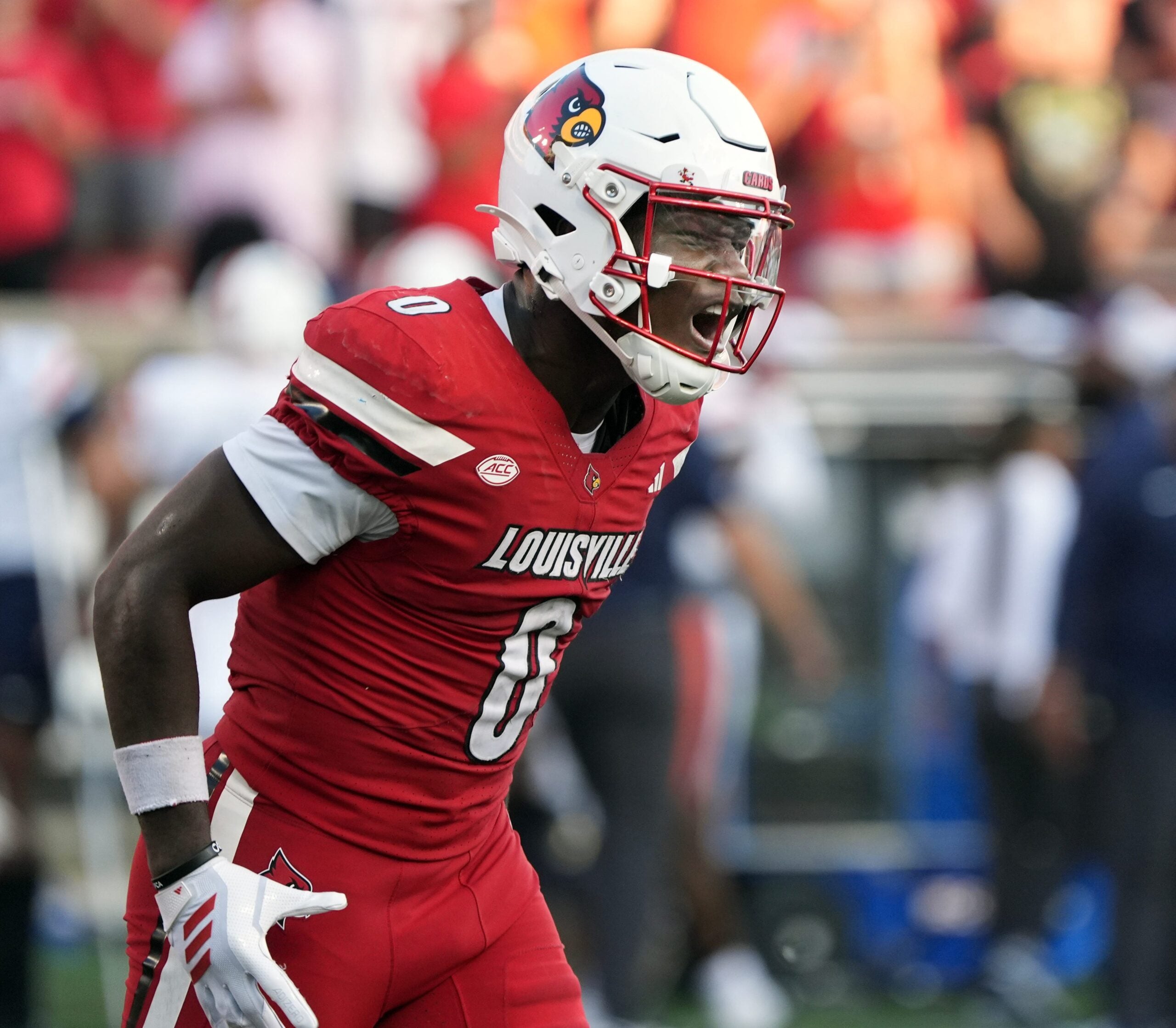 Louisville’s Chris Bell celebrates scoring a touchdown against Virginia at L&N Stadium Saturday. Oct. 4, 2025