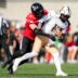 Oct 11, 2025; Cincinnati, Ohio, USA; Cincinnati Bearcats linebacker Jake Golday (11) attempts to tackle UCF Knights quarterback Cam Fancher (14) in the second half at Nippert Stadium.